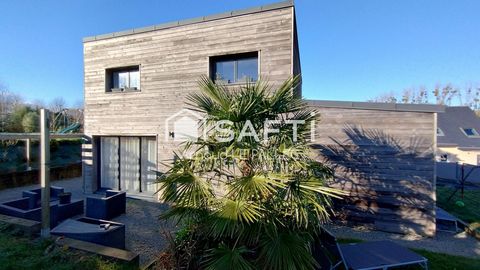 Au calme, dans une résidence récente, construction en bois