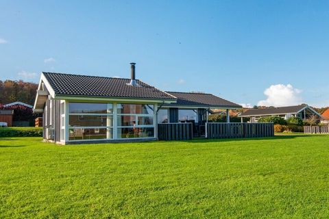 Holiday cottage located in quiet surroundings with view over the ocean. Modern furnishing with child-friendly mezzanine with mattresses and TV. Possibility for relaxing in the whirlpool and getting warm in the sauna. In the lovely summer evenings you...