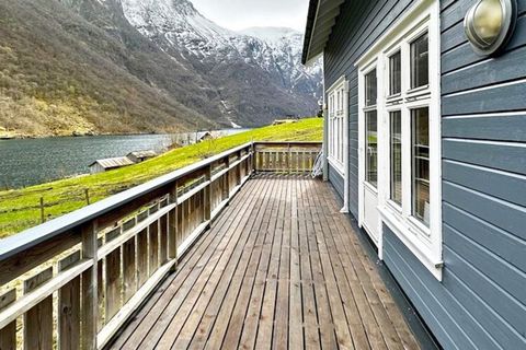 Holiday home a rare and magnificent landscape by the Nærøyfjord with its steep mountain sides, wild waterfalls, and cultural landscape. 25 km from Flåm Railway. Pleasant holiday home with wood-burning stove in the living room. Apple TV with Norwegian...
