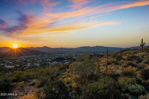 Mountainside Opportunity! Indulge in breathtaking panoramic views of the valley, gorgeous sunsets and beautiful city lights from this elevated 1.46 acre hillside lot on Black Mountain. Private road to the homesite is already paved and utilities are o...