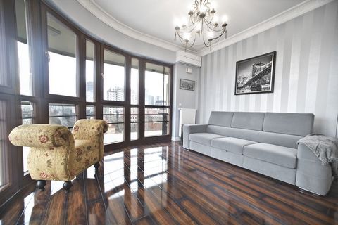 A spacious apartment with two separate bedrooms located in the heart of the business district of Wola, next to Warsaw Spire. We offer you a spacious living room with a fully equipped kitchenette and a terrace overlooking the panorama of Warsaw. A bat...