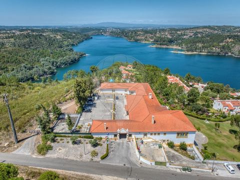 HOTEL SECRETS OF VALE MANSO Discover the perfect getaway in the heights with panoramic views of the stunning Castelo de Bode dam. Vale Manso is more than just accommodation; It is a sublime experience where luxury meets serenity. Strategically situat...
