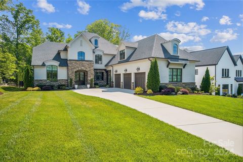 Arthur Rutenberg custom executive home in sought after Providence school district has everything you need! Incredible in-ground pool & outdoor living! Open concept floor plan, 5 beds, 5 full + 2 half baths, + bonus. 5th bedroom also secondary living ...