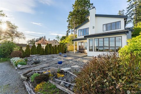 This rare gem offers the perfect Birch Bay location: serene beachfront and moments to the beach town action. W/panoramic ocean and Orcas Island vistas, this spacious property gives mid-century charm, featuring warm wood accents, vaulted ceilings, and...