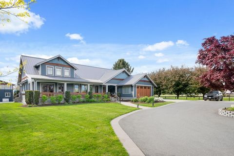 Nestled on a sprawling 14-acre estate, this property is a haven for outdoor enthusiasts and equestrians alike. Featuring 9 horse paddocks and a 1550 sqft barn equipped with a feed room, tack room, wash stall, and storage, it's a dream for horse lover...