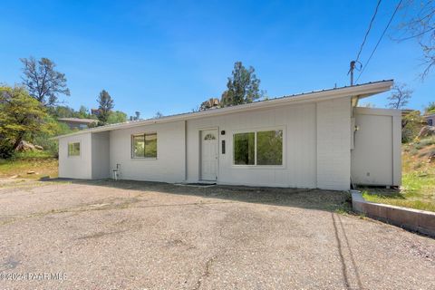 You won't find many opportunities like this. This 2 bedroom 1 bathroom single level home (with an additional potential bedroom) in Prescott, Arizona sits on 2.18 acres of land. Horses and/or livestock permitted within city guidelines for lot size. Zo...