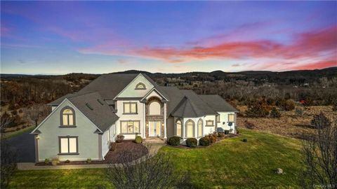 Step into the epitome of modern luxury with this custom-built stone and stucco residence, situated on a peaceful 5-acre lot, ready for immediate move-in. The home greets you with a grand two-story foyer and an impressive central staircase, setting th...