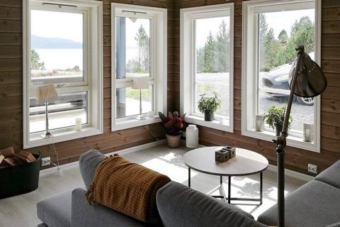 Modern holiday home with large terrace and sea views close to the fjord. Contains everything a modern home requires, such as internet and streaming TV in addition to Norwegian channels and Riks-TV. Frame mattresses in all rooms. Cozy wood burning sto...