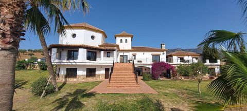 Magnificent villa built in a typical Andalusian Cortijo-Style situated approximately 60 kms from Marbella, 40 kms from Málaga and 30 kms from Coin.The property is accessed via a road in good condition which is approximately 2 kms from the main countr...