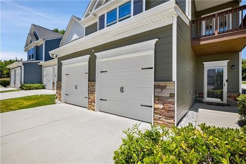 Welcome home to contemporary living in this pristine, like-new townhouse offering a perfect blend of style and functionality. Approximately 10 minute's from all conveniences and 30 minutes from the Airport and downtown. Huge Kitchen island overlookin...