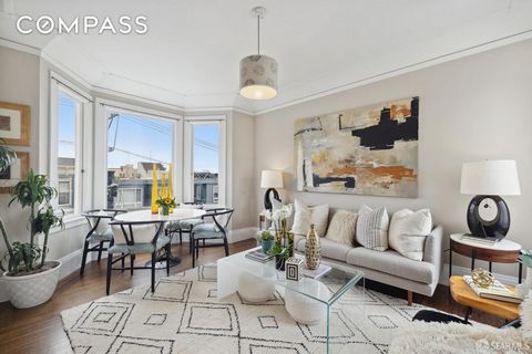 Classic Pacific Heights penthouse with lovely outlooks! This bright and sunny condominium, perched on the top floor of the building, features eastern outlooks and with beautiful Edwardian details including moldings and bordered hardwood floors. The p...