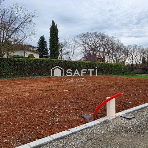 Terrain viabilisé de 412 m² dans un lotissement.