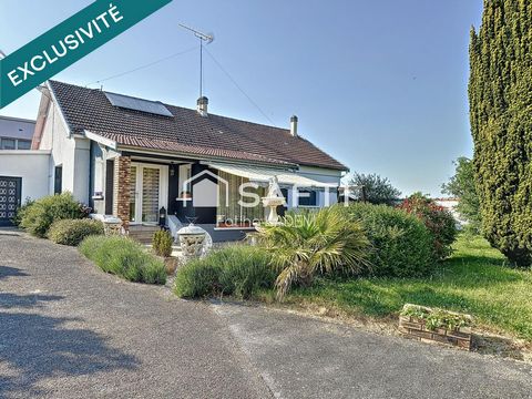 Maison de plain-pied atypique dans son écrin de verdure