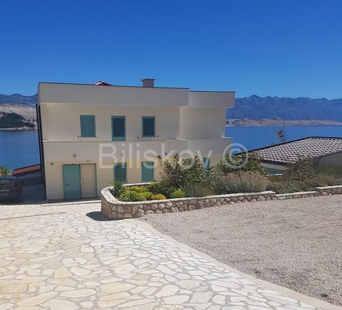 Pag,Kolan,beautiful house by the sea with access to the beach. It consists of a ground floor, first floor and a high attic. Ground floor: two bedroom apartment consisting of kitchen, 2 bedrooms and bathroom. To the two-bedroom apartment, there is a f...