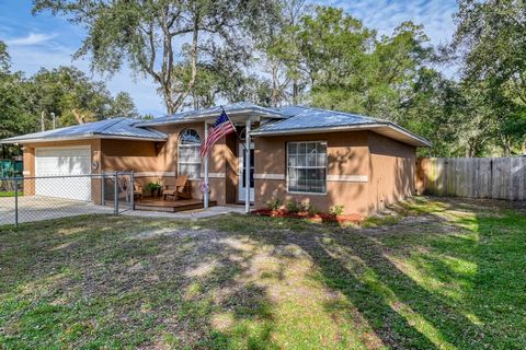 This concrete block home is located in a NO HOA community and settled on a high and dry lot in flood zone X. New roof in 2018, new A/C in 2016 & water heater replaced in 2021. Also replaced drain field, sump pump and septic tank pumped & inspected Au...