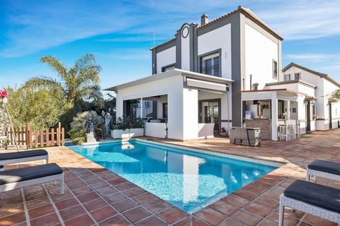 Nestled within landscaped gardens, surrounded by mature vegetation, offering complete privacy in the heart of Alhaurin el Grande, within easy walking distance to shops, bars and schools, this beautiful villa with annex guest house offers all you wish...