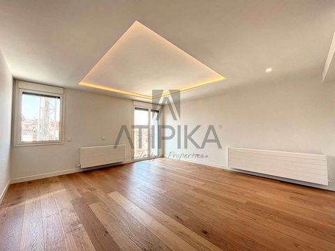 Magnificent newly built apartment with two bedrooms located in a building with elevator in the heart of l'Eixample. Its location allows a convenient connection by public transport, as well as the possibility of walking to many places thanks to its ce...