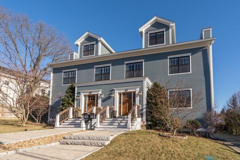 A rare chance to purchase a turnkey home with soaring ceilings, sweeping views of Boston & Harvard, a private yard, and heated garage parking. The expansive open floor plan offers a formal living room, dining room, and 27' eat-in chef's kitchen with ...