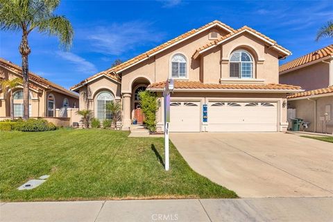 Gorgeous pool home in Rancho Vista Estates! Relax with sweeping views from the resort style back yard. Entertain family and friends while enjoying the sunset with tropical landscaping, pool, spa and bubbling waterfall. Open and spacious, this well la...