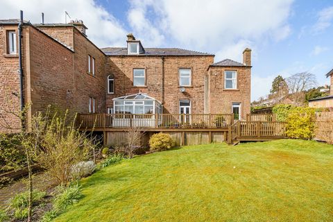 Accommodation;   The front entrance leads into a grand and elegant hallway with period staircase and mouldings. The sitting room with delightful bay window, mouldings and picture rail enjoys a Woodwarm stove. Across the hall is a well-appointed spaci...