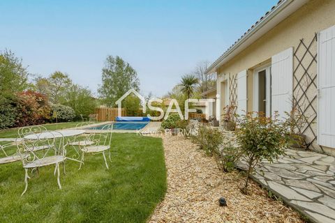 30 minutes from Bordeaux, let yourself be charmed by this pleasant family house full of character of 220 m² on a beautiful plot of 1000 m² with terraces, heated swimming pool and landscaped garden! Totally independent, in a quiet residential developm...