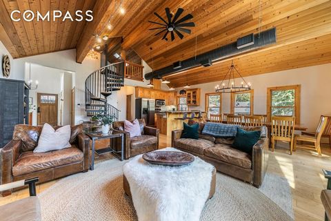 Situated just seconds away from the tranquil shores of Donner Lake, this captivating 4-bedroom, 3-bathroom home offers the perfect blend of modern comfort and natural beauty. Slate floors invite you into this 2006-built home, where the expansive grea...