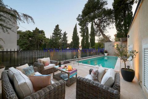 A beautiful villa for sale located in one of the elite parts of Split. The villa has a southern orientation and is located in a quiet street surrounded by Mediterranean greenery, just a few minutes' walk from the sandy beach, the waterfront and the h...
