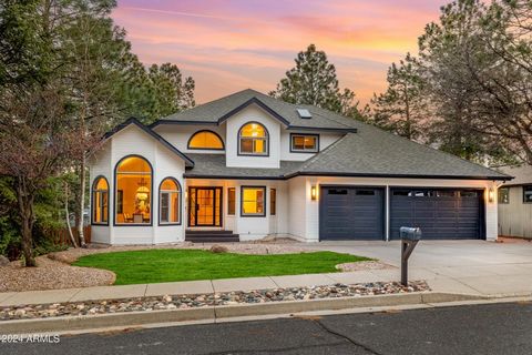 Discover this luxurious, fully remodeled 4300 square foot home located in the meticulously maintained Skyline neighborhood, just a short distance from the entrance to the forest at the foot of Mount Elden. This residence offers breathtaking views of ...